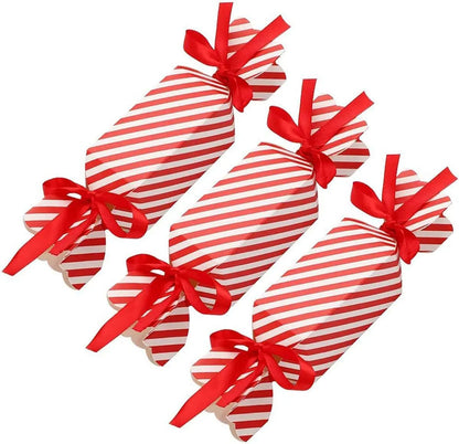 Three red and white candy cane striped Christmas favor boxes with red satin ribbons