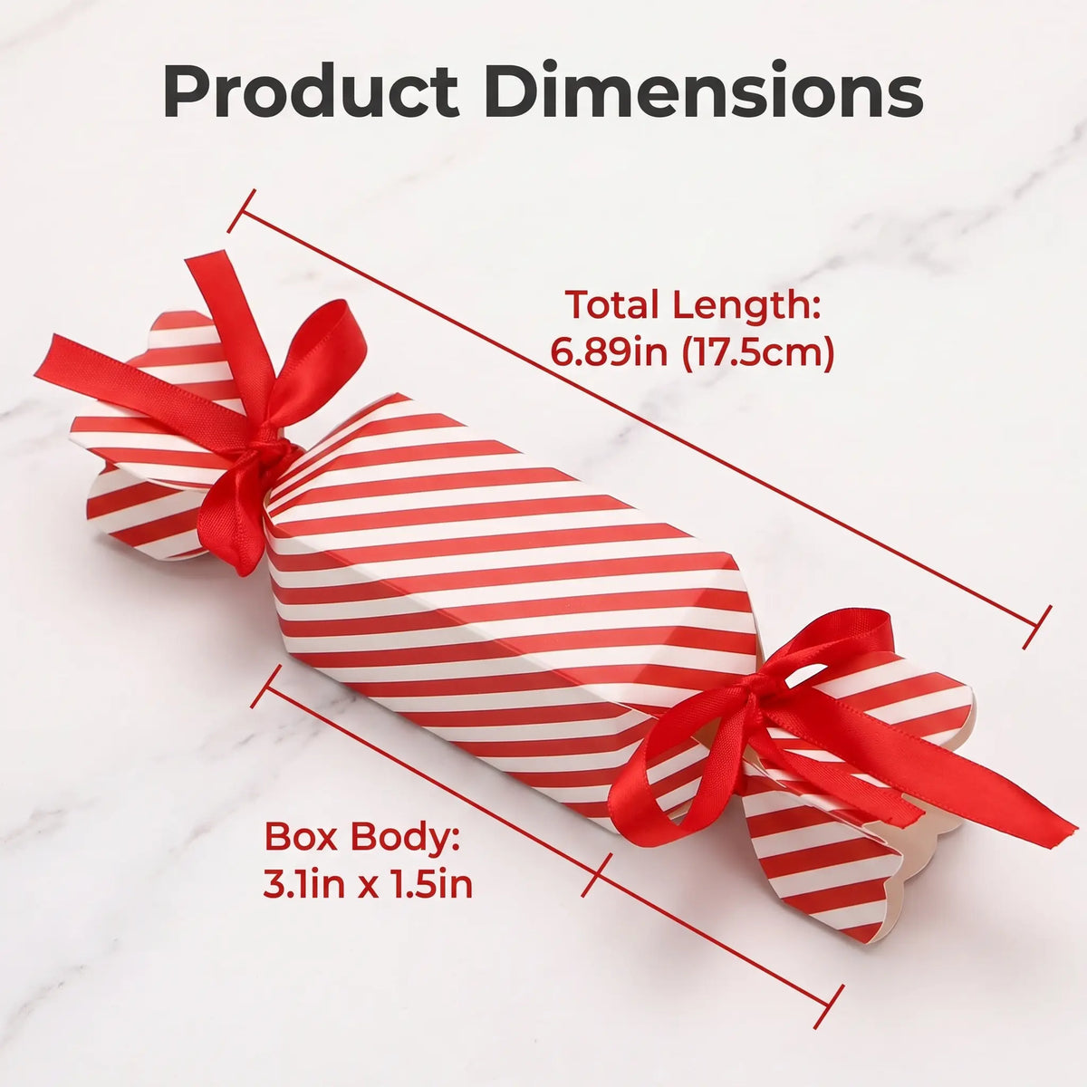 Christmas candy favor box holiday flatlay styling with candy canes and pinecones